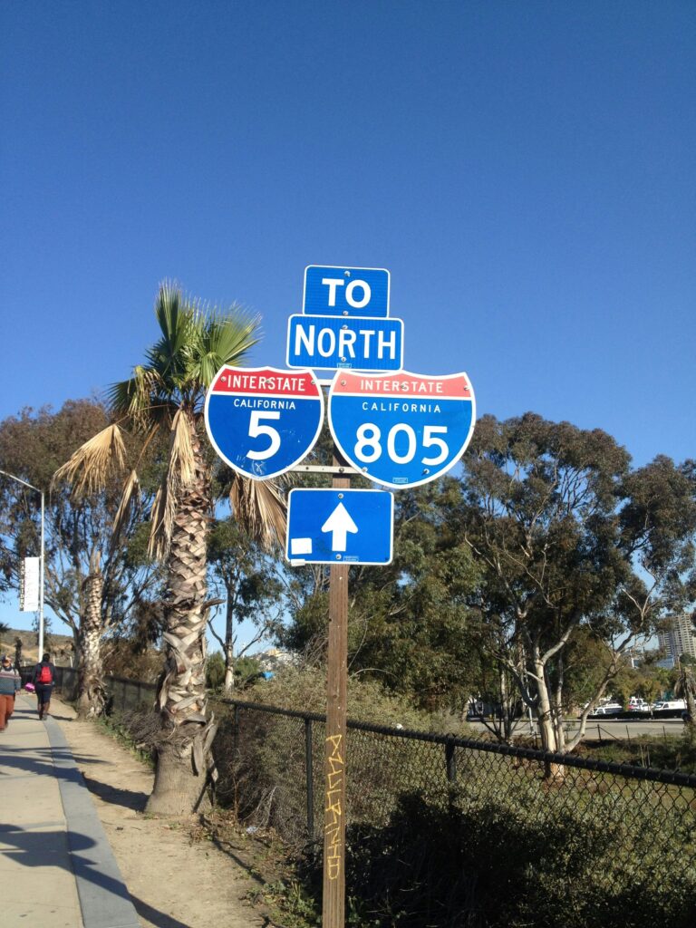 Highway signs on California freeways where trucking accidents often occur