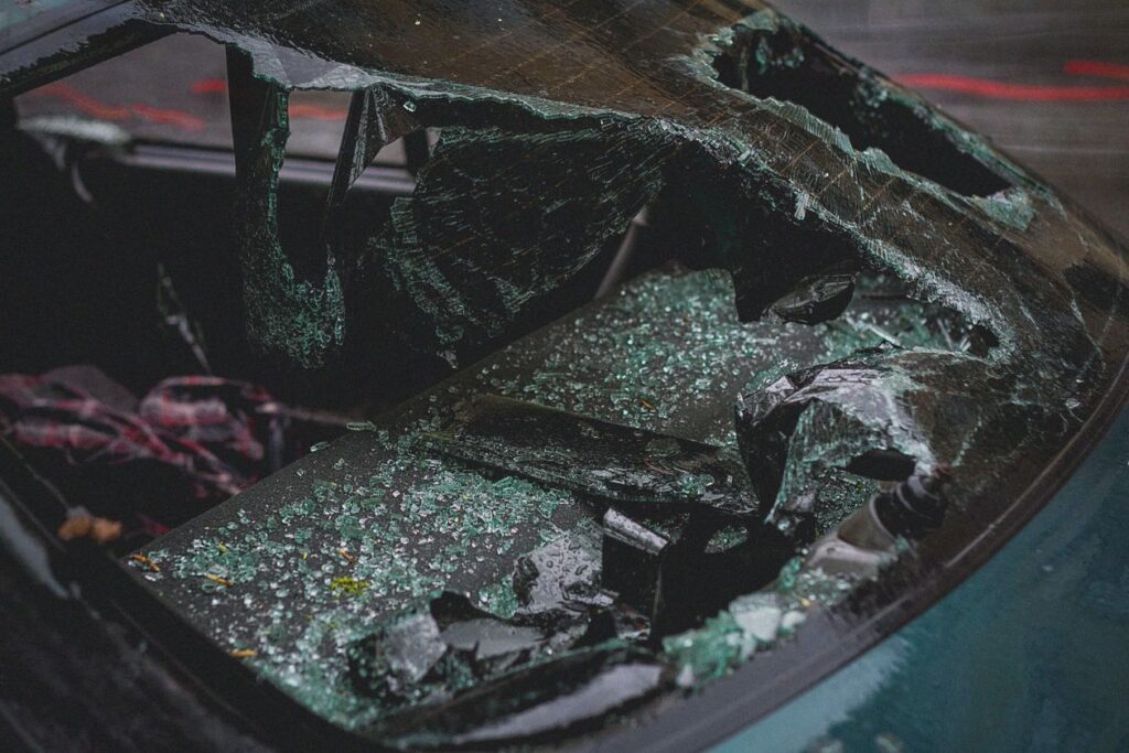 Shattered car windshield after a crash